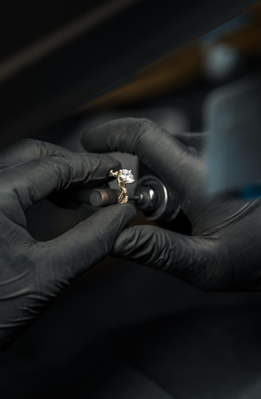 Jeweler crafting a diamond engagement ring in the Brilliance workshop