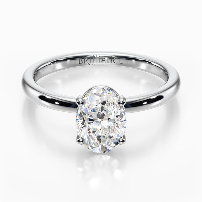 Basket Style Solitaire Engagement Ring in White Gold
