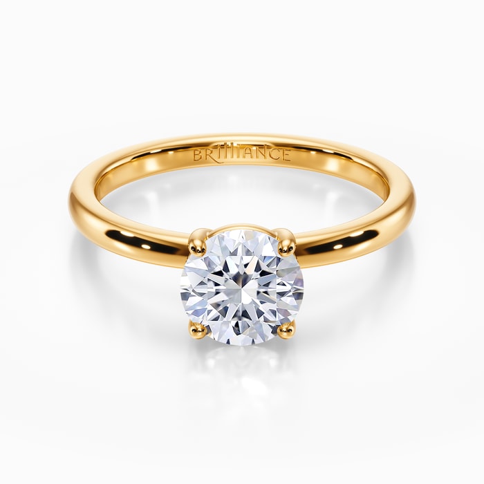 Basket Style Solitaire Engagement Ring in Yellow Gold
