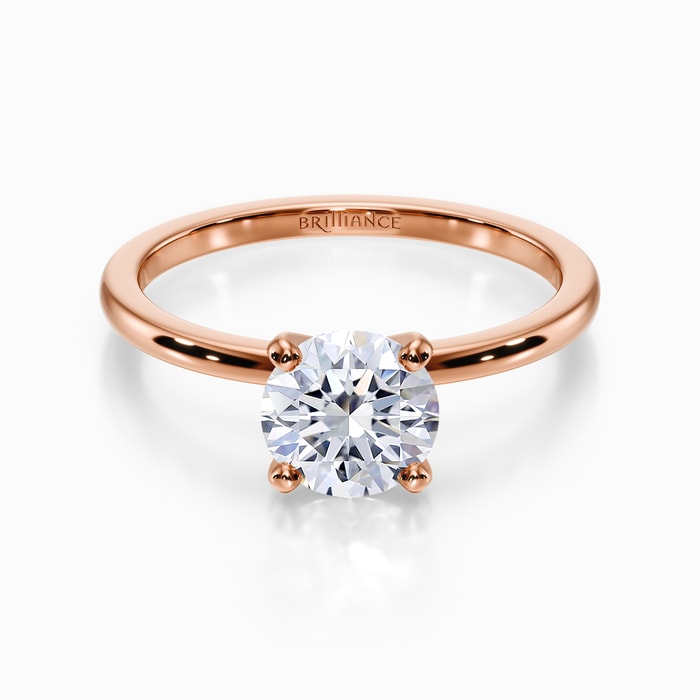 Dainty Solitaire Engagement Ring in Rose Gold