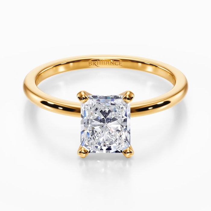 Dainty Solitaire Engagement Ring in Yellow Gold