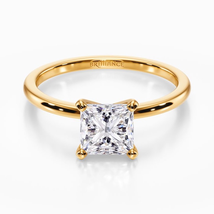 Dainty Solitaire Engagement Ring in Yellow Gold