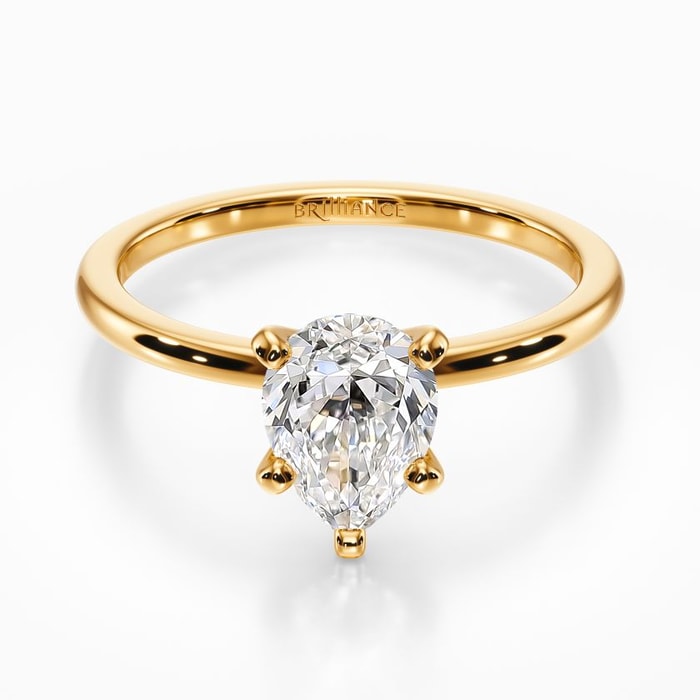 Dainty Solitaire Engagement Ring in Yellow Gold