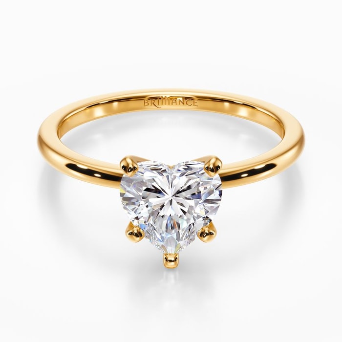 Dainty Solitaire Engagement Ring in Yellow Gold