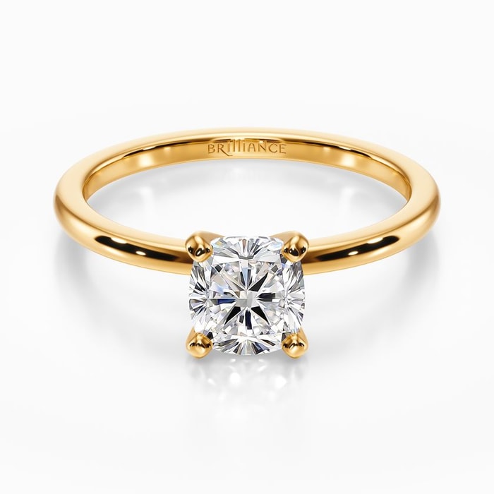 Dainty Solitaire Engagement Ring in Yellow Gold