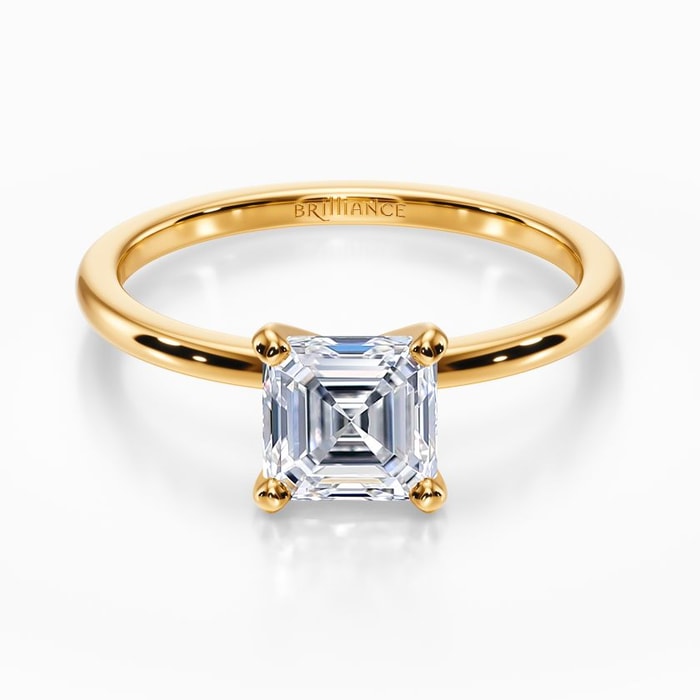 Dainty Solitaire Engagement Ring in Yellow Gold