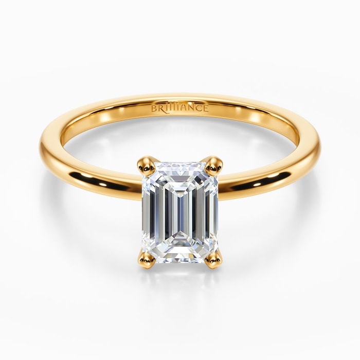 Dainty Solitaire Engagement Ring in Yellow Gold