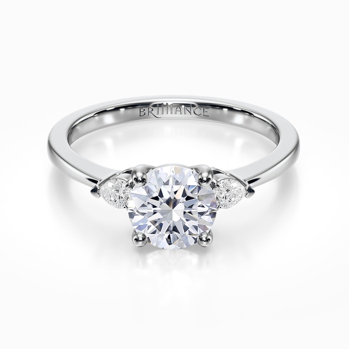 Three Stone Pear Cut Diamond Ring in White Gold (0.24 Carat)
