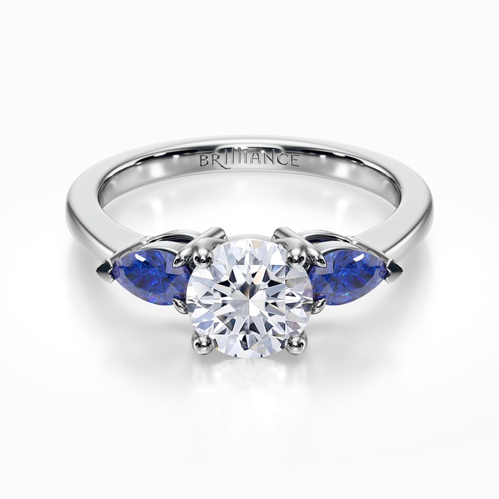 Pear Sapphire Side Stone Engagement Ring in White Gold