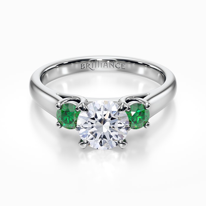 Emerald Side Stone Engagement Ring in White Gold