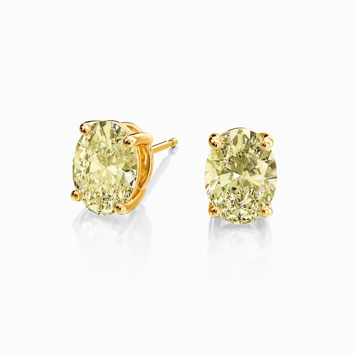 Fancy Yellow Oval Lab Diamond Stud Earrings in Yellow Gold (2 Carat)