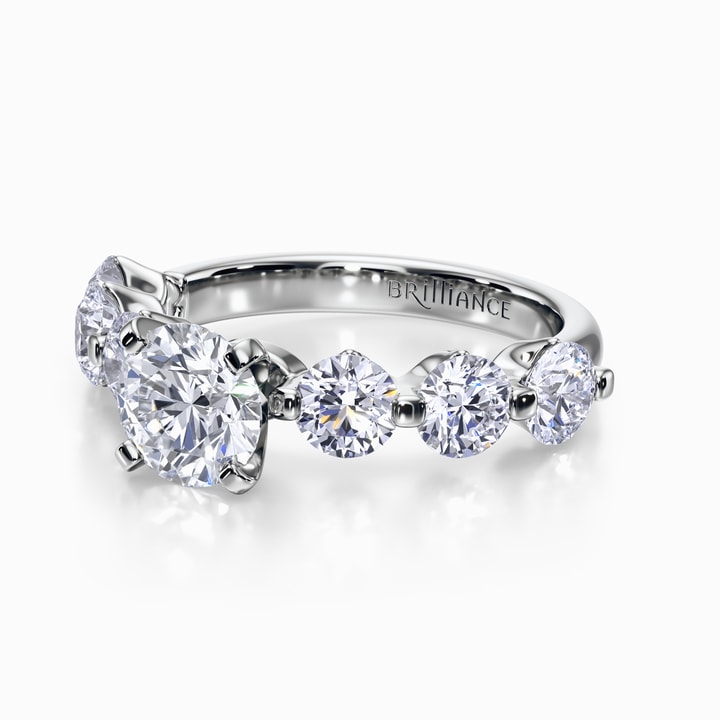 Engagement Ring with Floating Diamonds in Platinum