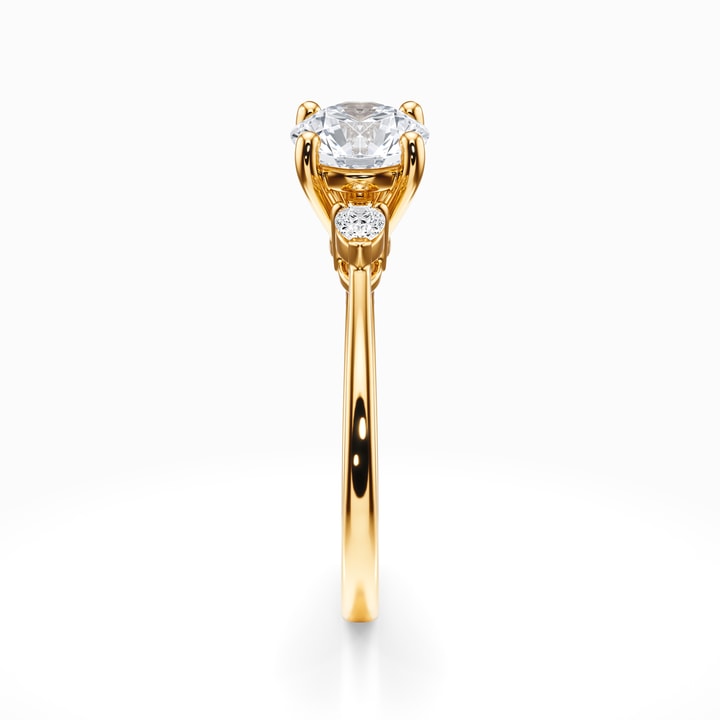 Gold Diamond Engagement Ring With Pear Cut Side Stones