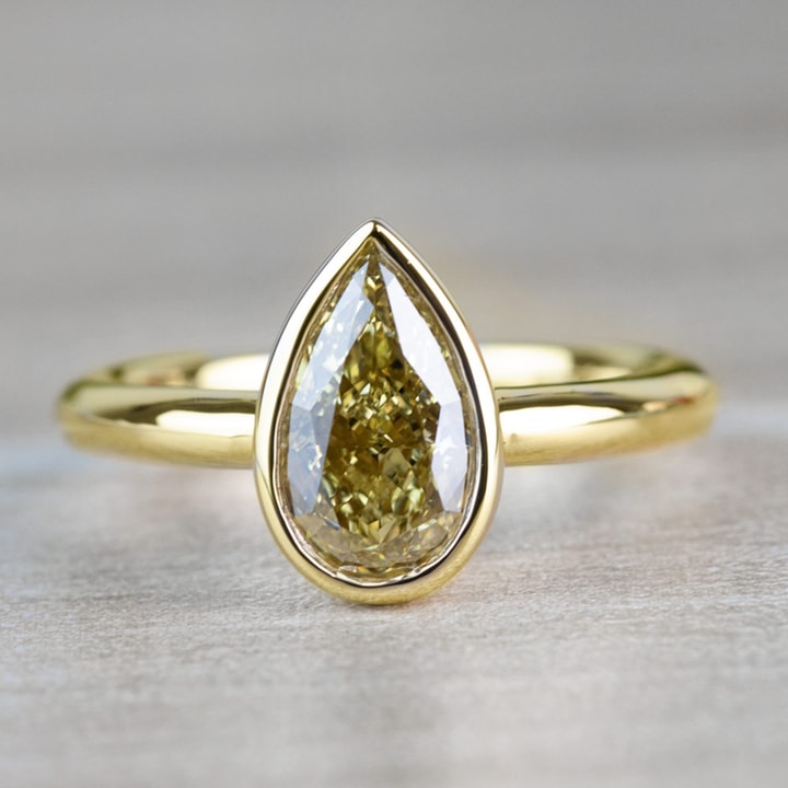 1.25 Carat Fancy Yellow Pear Diamond Bezel Solitaire Engagement Ring
