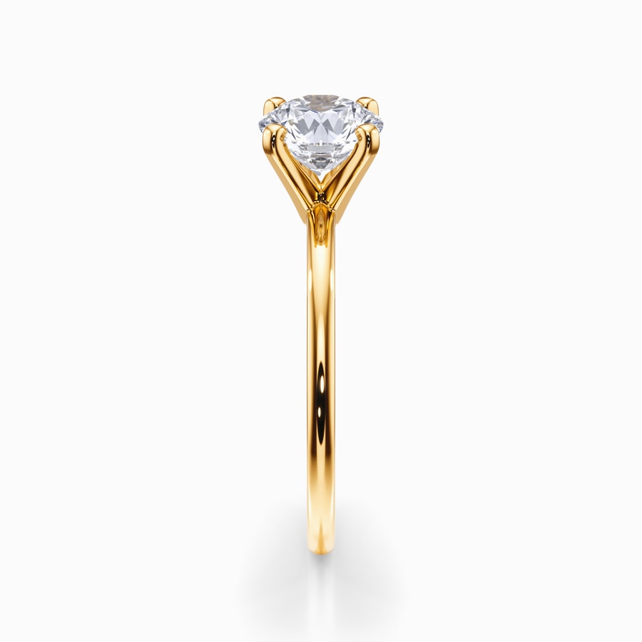 Dainty Solitaire Engagement Ring in Yellow Gold