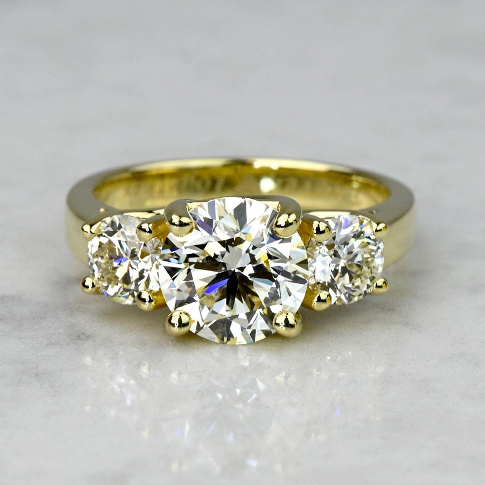 2 Carat Round Three Stone Engagement Ring in Yellow Gold - small