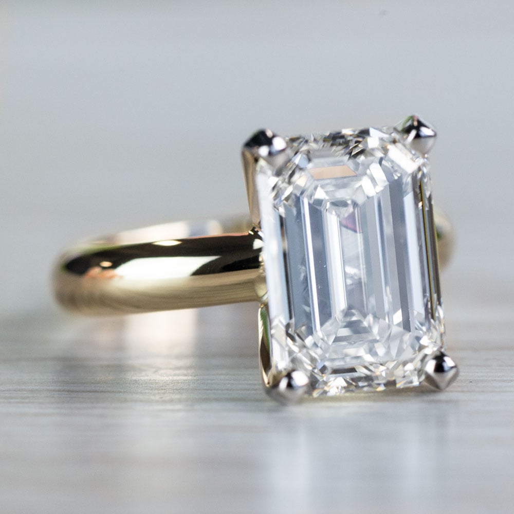 4 Carat Emerald Cut Diamond Ring in Yellow Gold - small angle 3