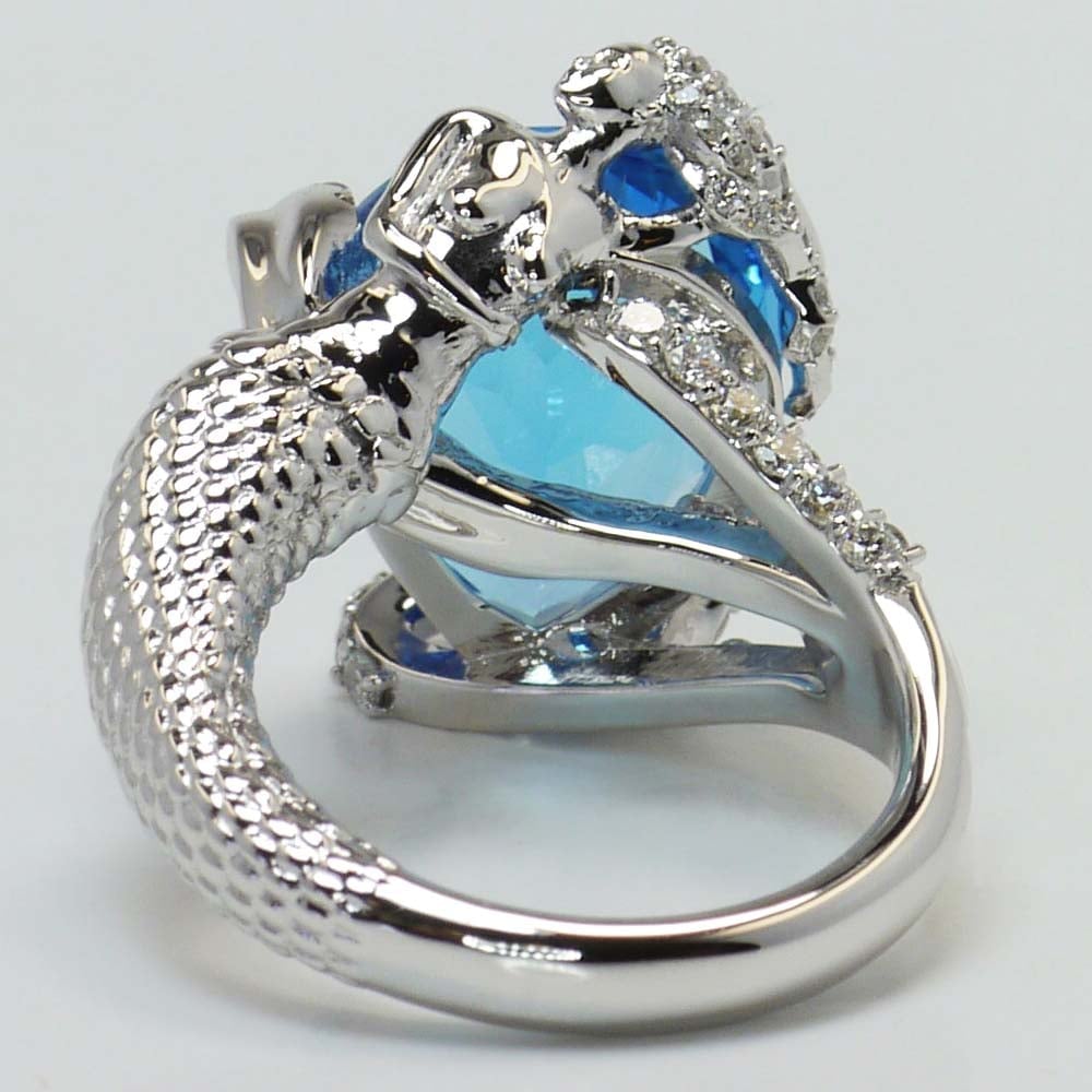 Pear Shaped Blue Topaz Ring In Mermaid Setting angle 4