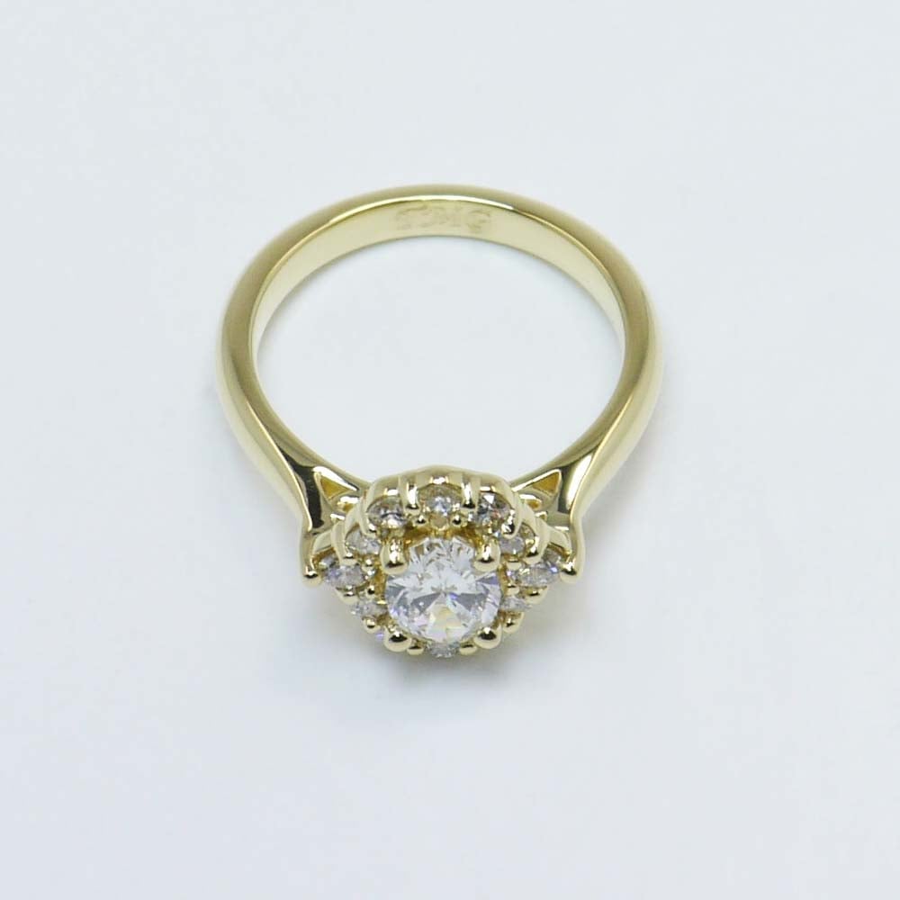 0.60 Carat Oval Diamond Ring With Halo In Gold  angle 4