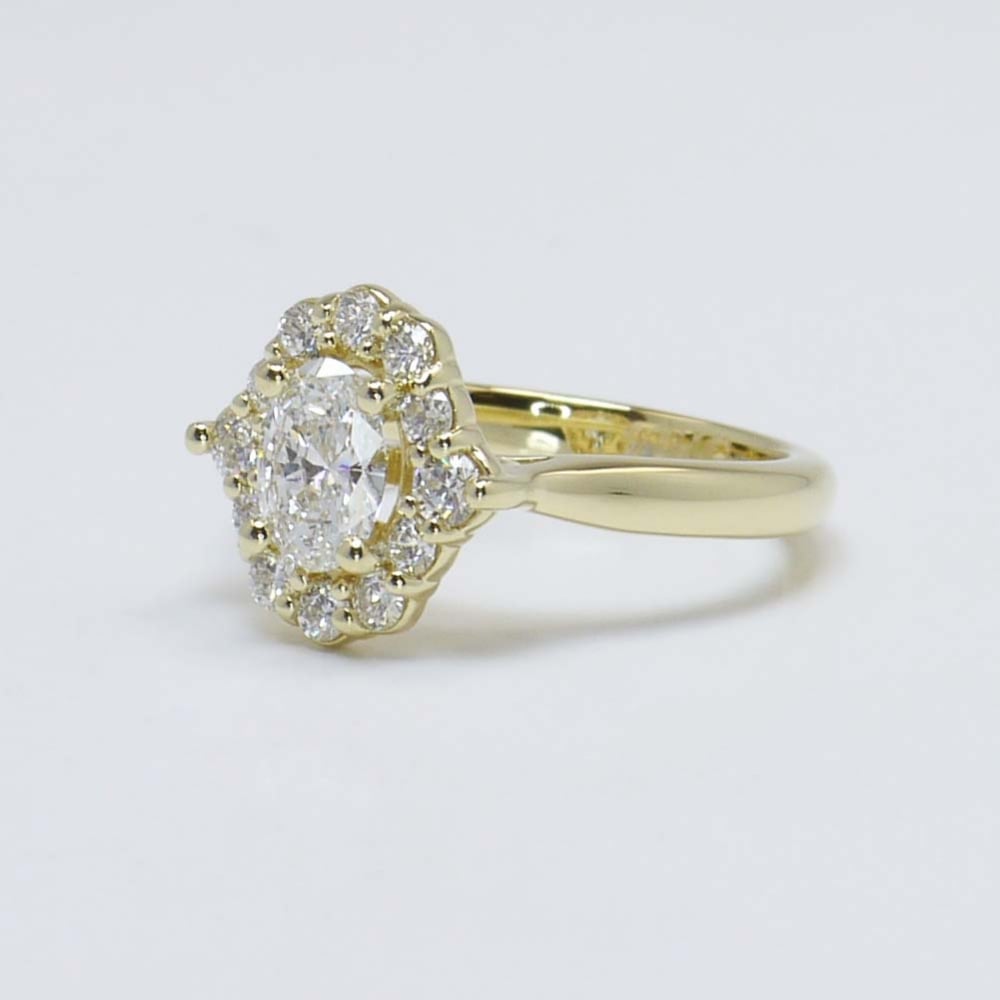 0.60 Carat Oval Diamond Ring With Halo In Gold  angle 2