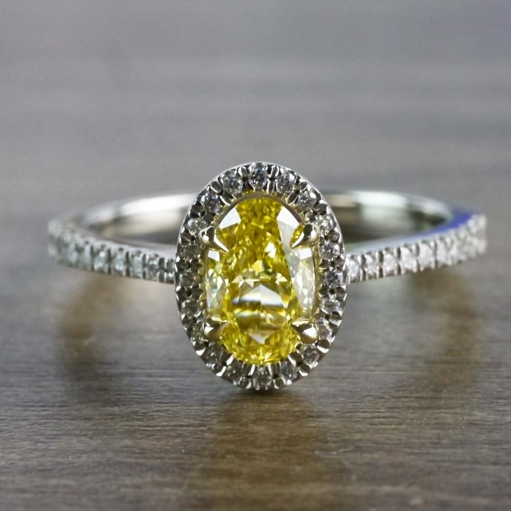 Intense Fancy Oval Yellow Diamond Ring In A Diamond Halo - small