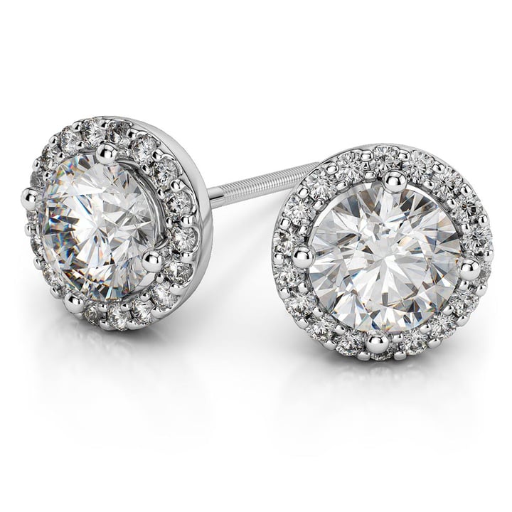 https://www.brilliance.com/cdn-cgi/image/width=720,height=720,quality=85/sites/default/files/earrings/round-halo-moissanite-stud-earrings-7-5-mm-white-gold/round-halo-moissanite-stud-earrings-7-5-mm-white-gold-1.jpg