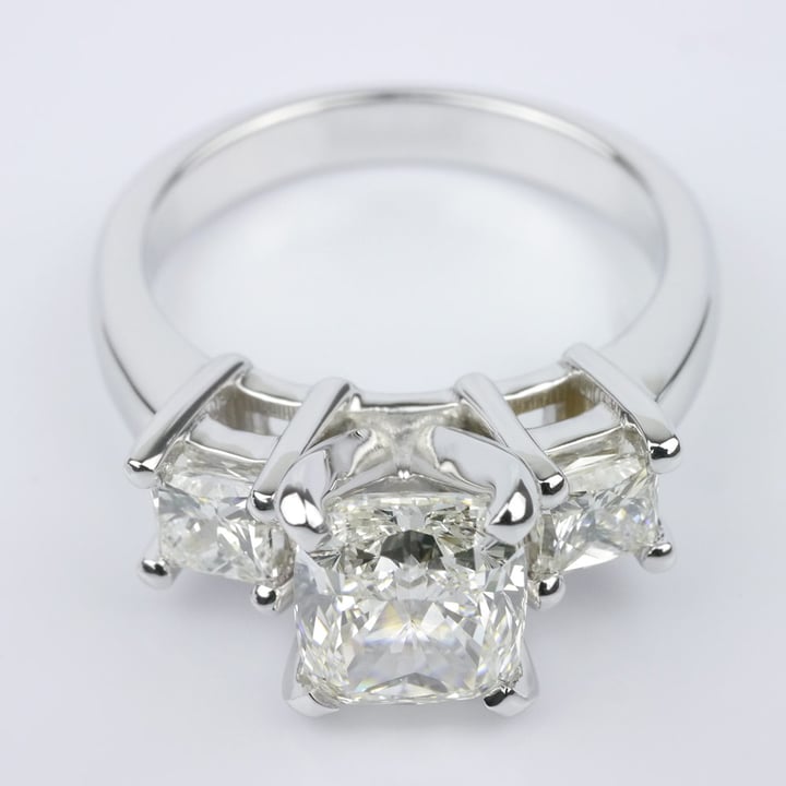 Cushion Cut Engagement Ring With Two Princess Accents