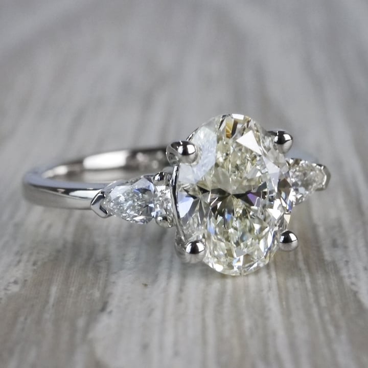 Outstanding Oval Diamond & Pear Cut Diamond Ring angle 3