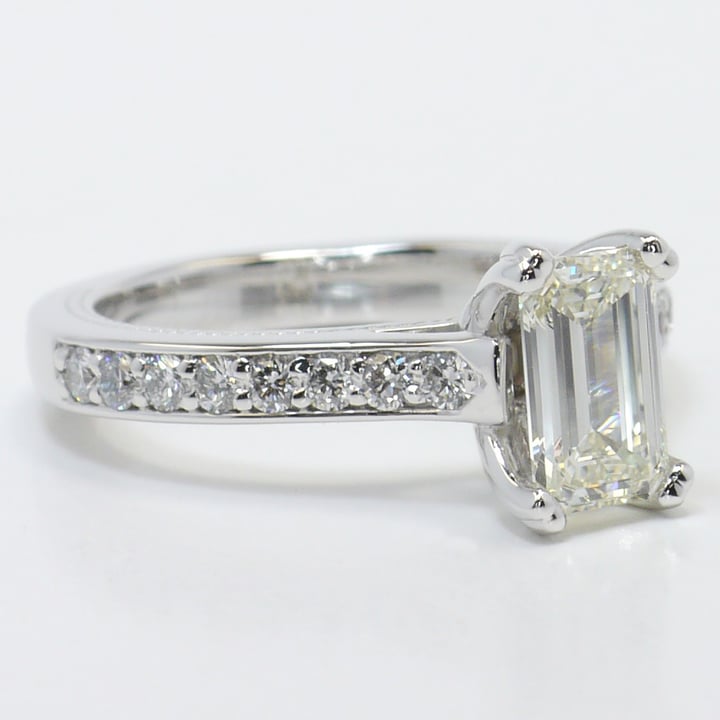 Cathedral 1 Carat Emerald Cut Engagement Ring With Diamond Band angle 3
