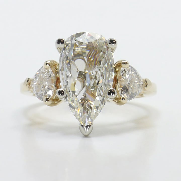Gold 2.35 Carat Pear Shaped Engagement Ring With Heart Accents
