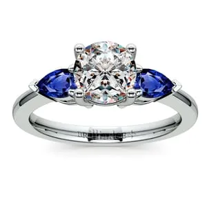3 Stone Engagement Ring With Sapphire Pear Side Stones In Palladium