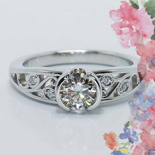 Art Nouveau style ring design with intricate floral motifs and craftsmanship.