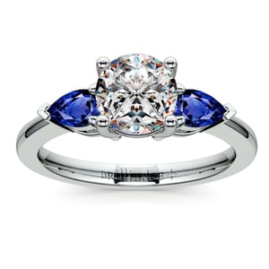 3 Stone Engagement Ring With Sapphire Pear Side Stones In Palladium