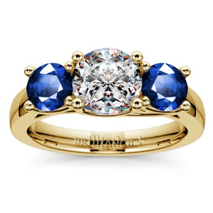 Three Stone Sapphire And Diamond Ring In Yellow Gold