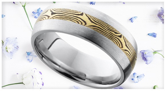 Image showcasing alternative mokume gane wedding rings with intricate metal patterns.