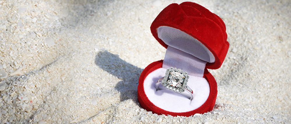 Asscher diamond ring in a jwelry box