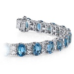 Swiss Blue Topaz Bracelet With Accent Diamonds In White Gold (17 Ctw) | Thumbnail 01