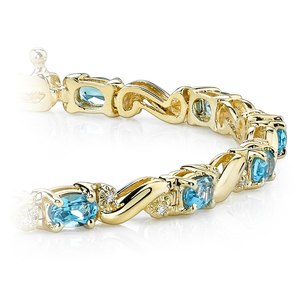 Swirl Diamond & Swiss Blue Topaz Gem Bracelet In Yellow Gold (4 ctw)