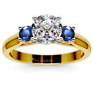 Round Sapphire Gemstone Engagement Ring in Yellow Gold