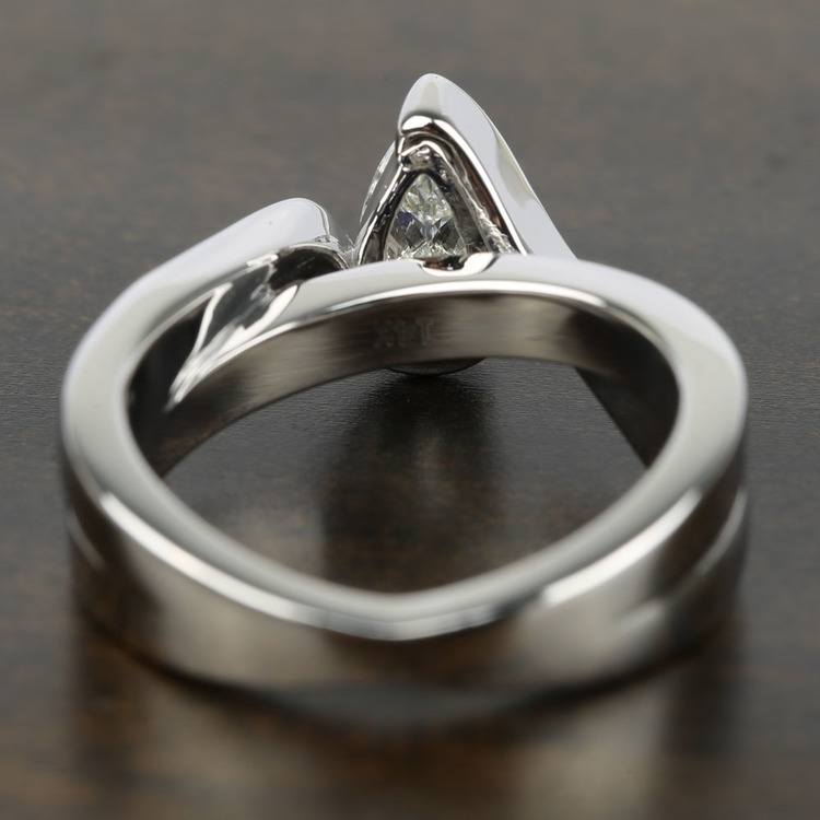 Bezel Bridge Sapphire Engagement Ring with Pear Diamond
