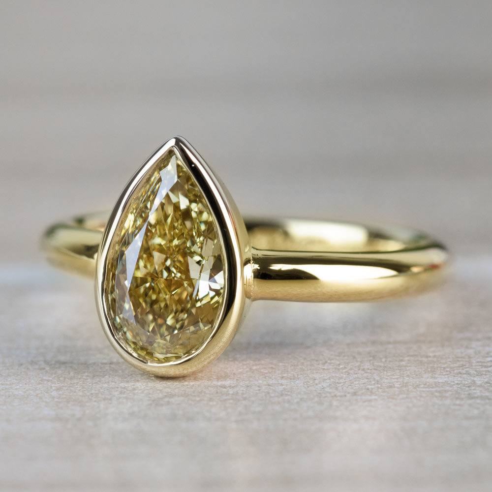 1.25 Carat Fancy Yellow Pear Diamond Bezel Solitaire Engagement Ring