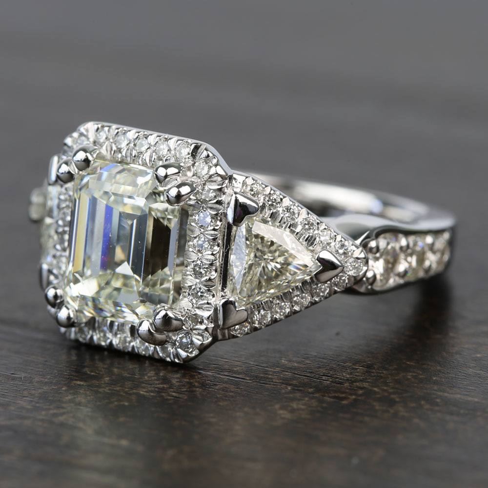 Emerald Cut Diamond | Trillion Side Stones Halo Ring