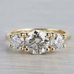Glittering Three Stone Round Diamond Ring In Yellow Gold - small